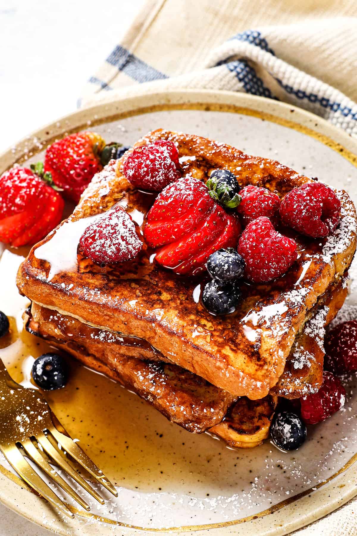 up close of homemade French toast showing how golden and crispy it is 