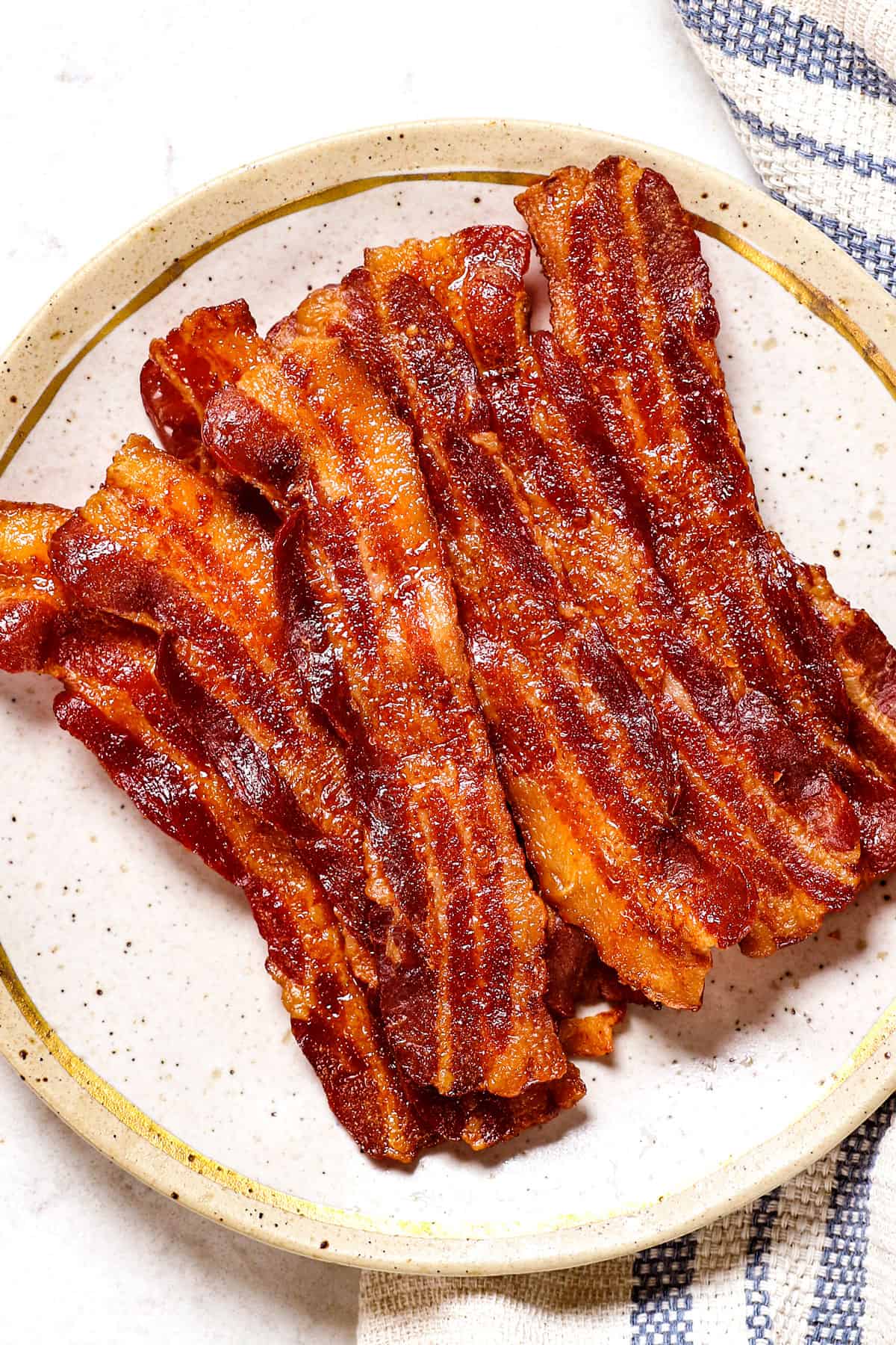 showing how to serve oven baked bacon on a plate