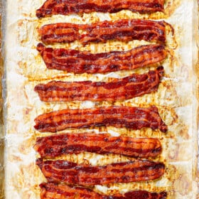 showing how to cook bacon in the oven by cooking until crispy