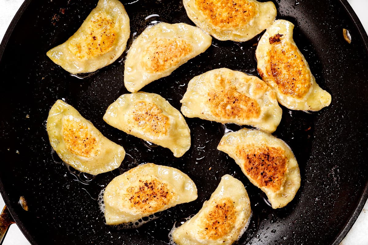 showing how to make pierogi recipe by pan frying until golden