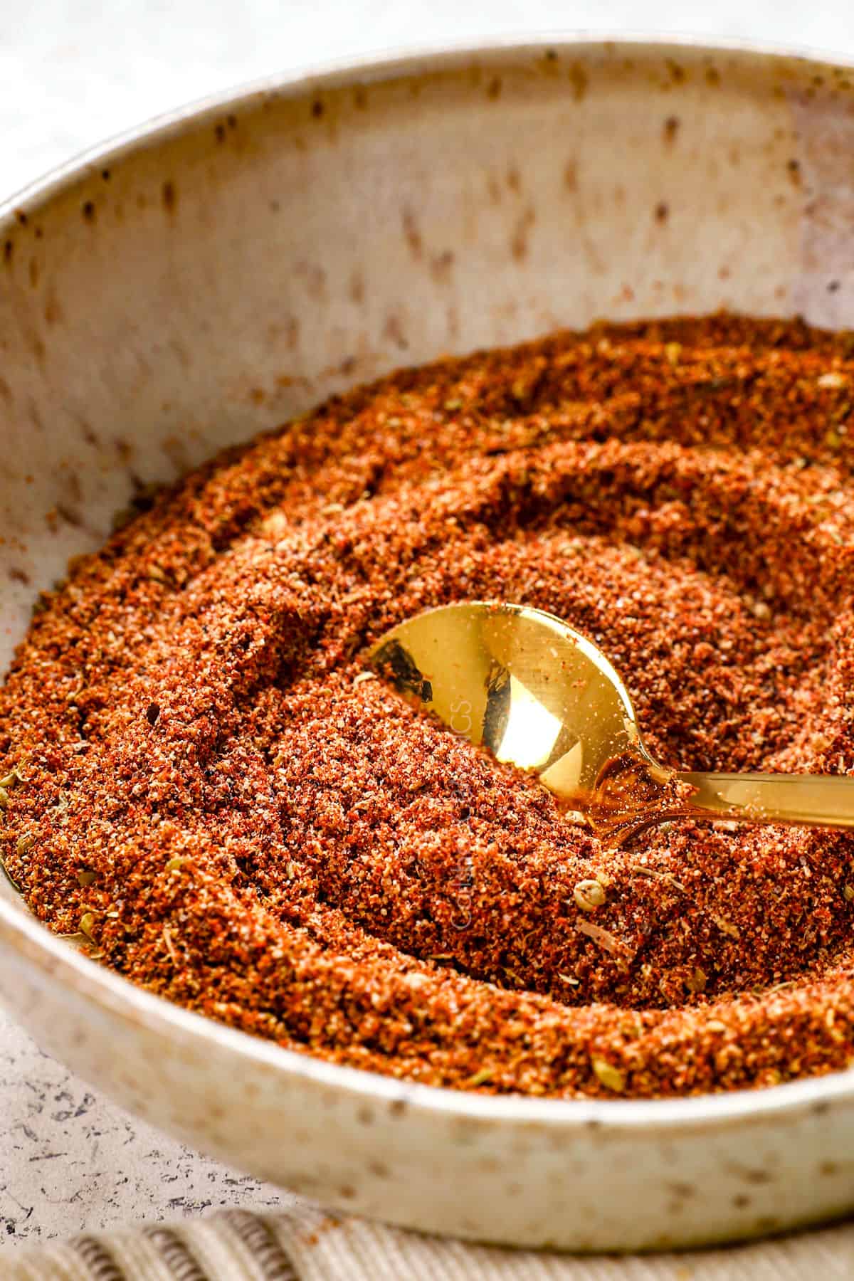 up close of homemade taco seasoning recipe showing all the seasonings in a bowl