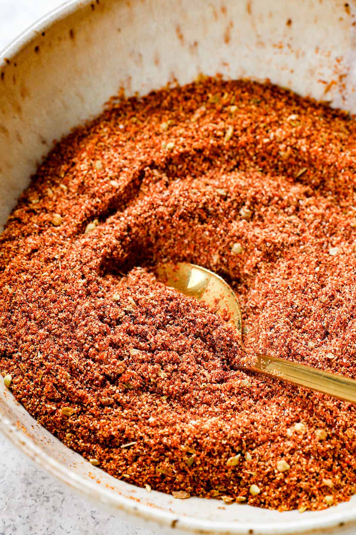 showing how to season taco meat by making homemade taco seasoning