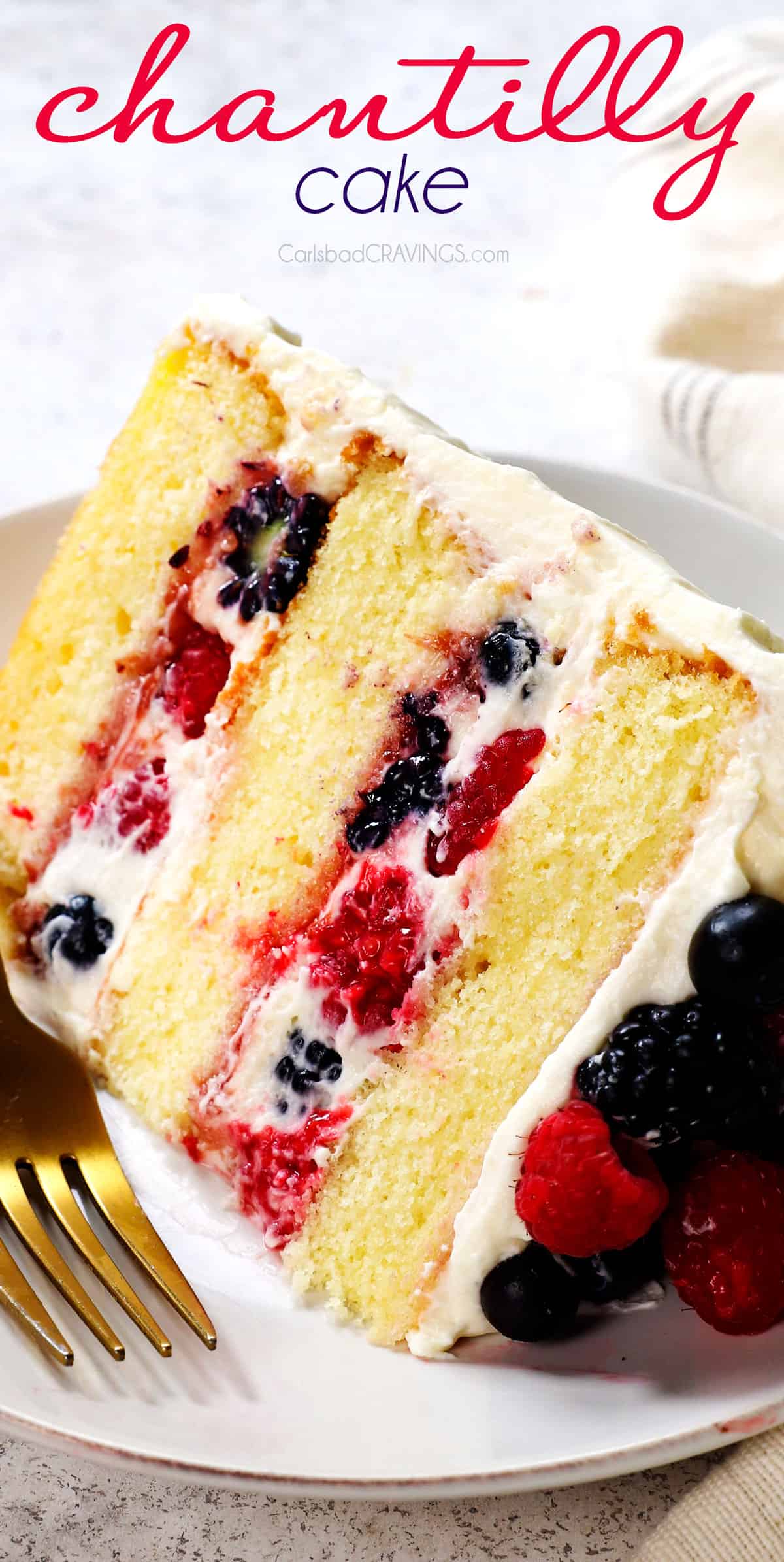 Chantilly cake layered with Chantilly cream and berries on a vanilla cake