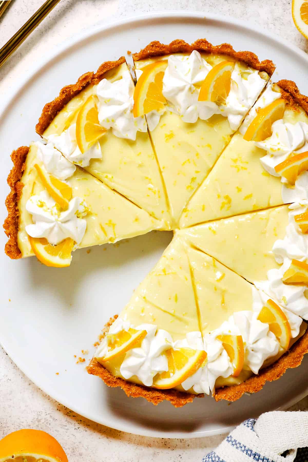 top view of lemon pie recipe showing how to decorate with whipped cream topping