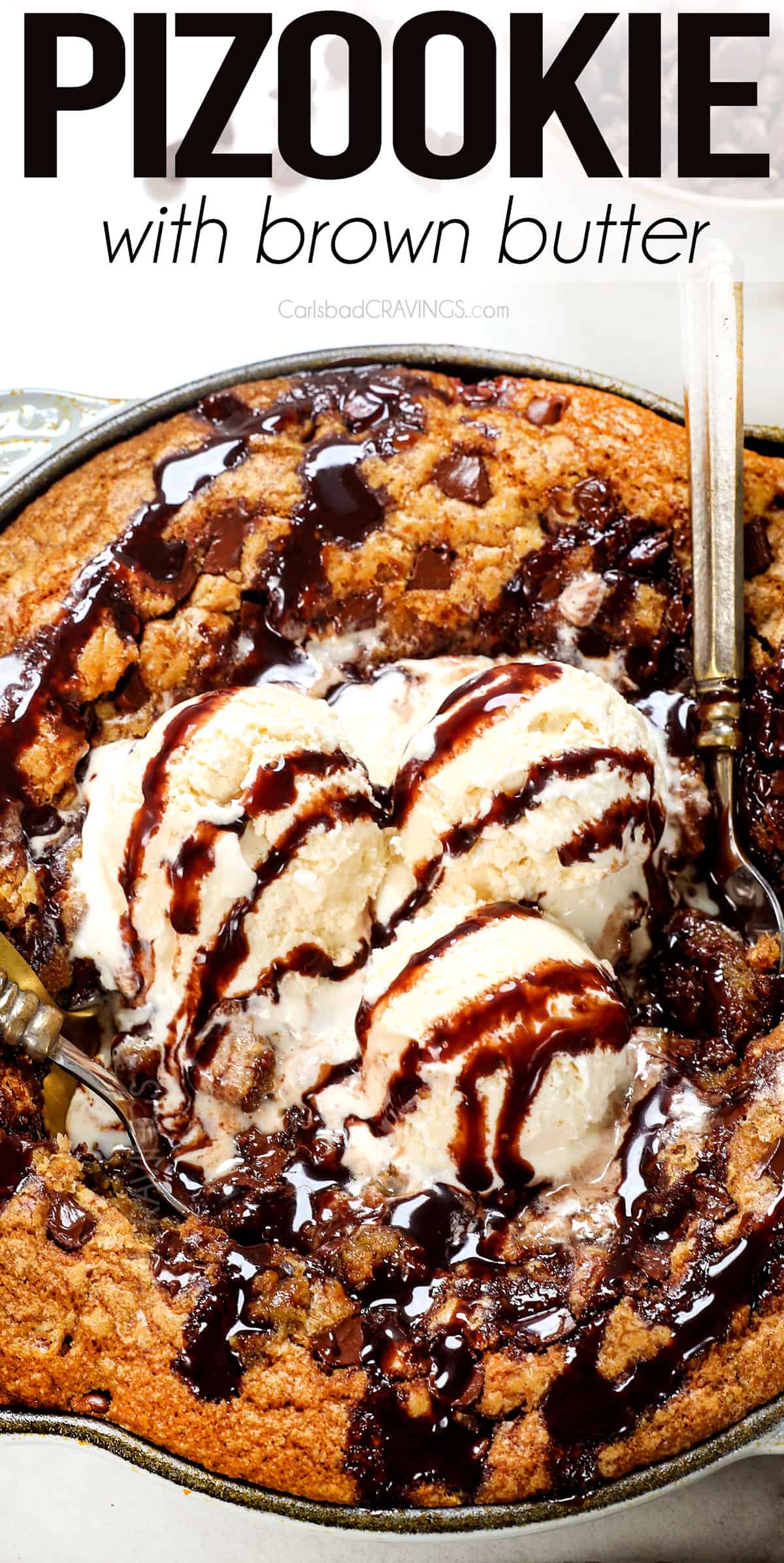 pizookie in a cast iron skillet topped with ice cream 