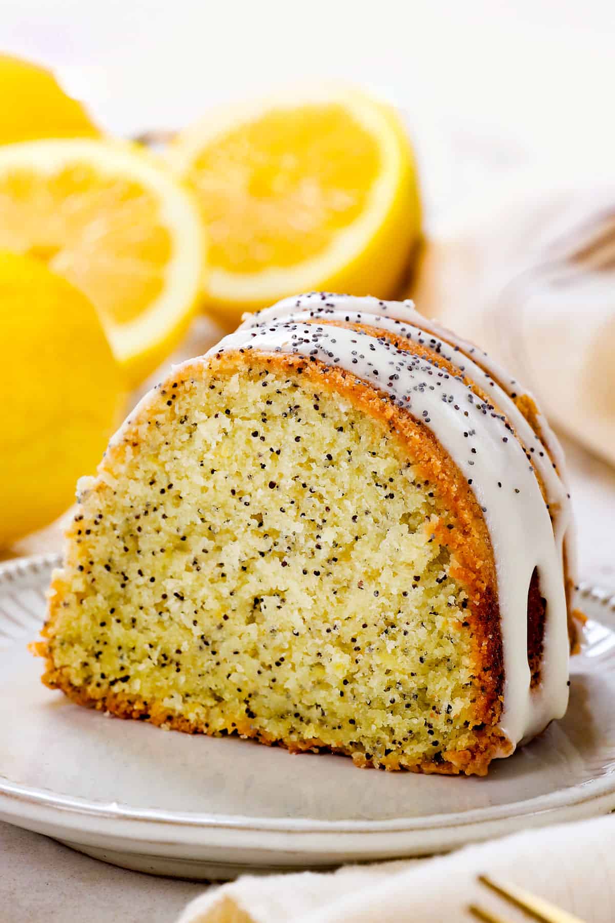 lemon poppy seed cake served on a white plate