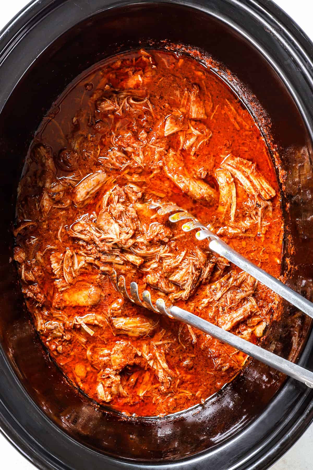 top view of cooking cochinita pibil in the slow cooker