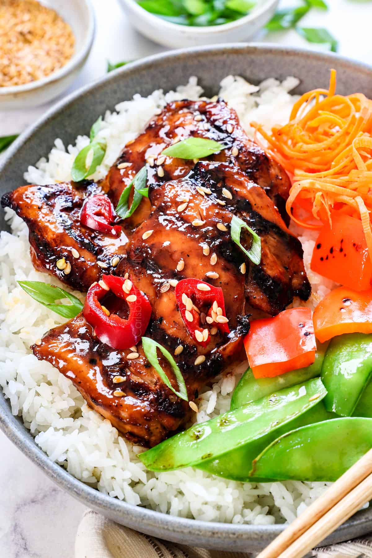 Asian chicken marinade being served with grilled chicken thighs 