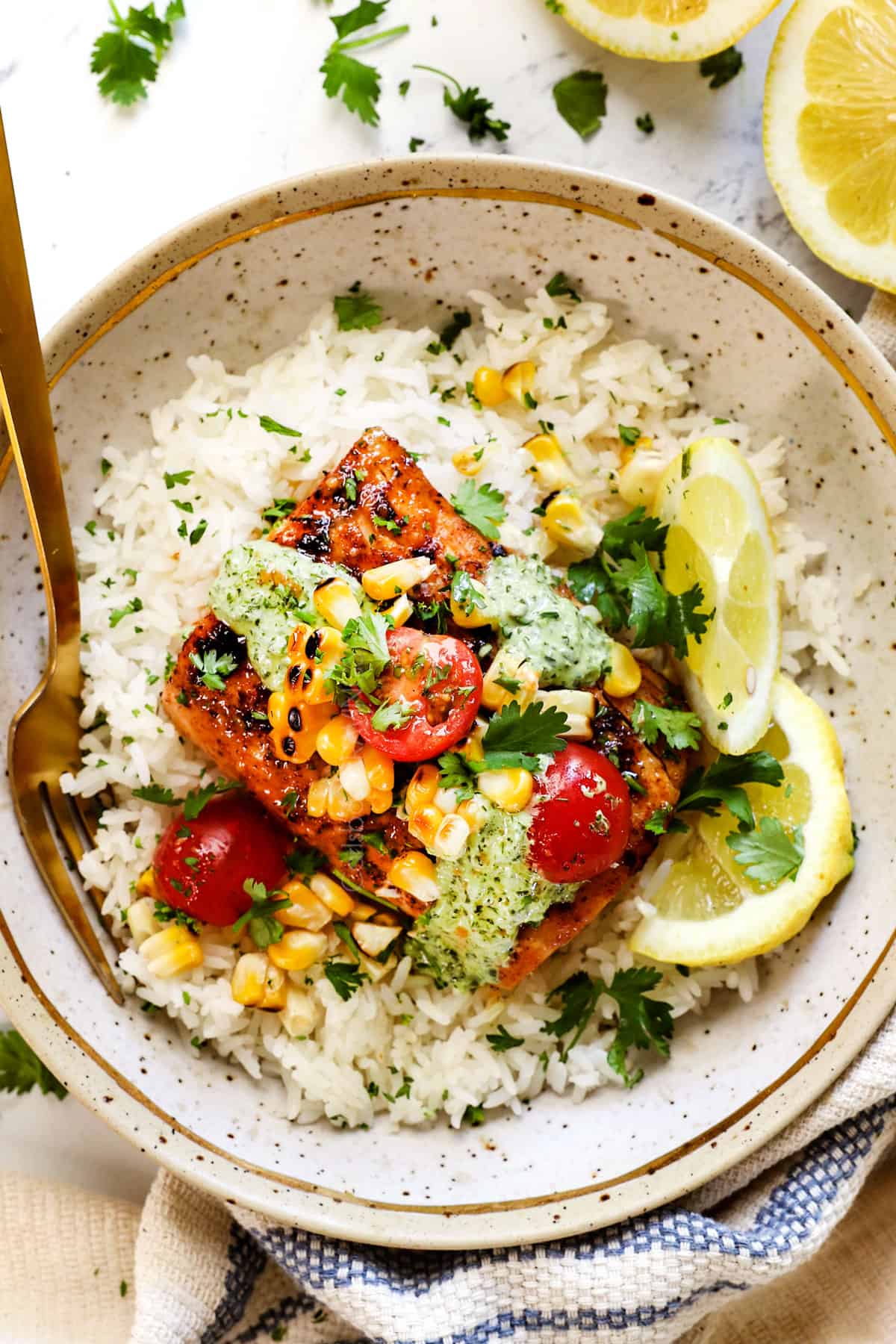 top view of grilled mahi mahi being served with rice and vegetables