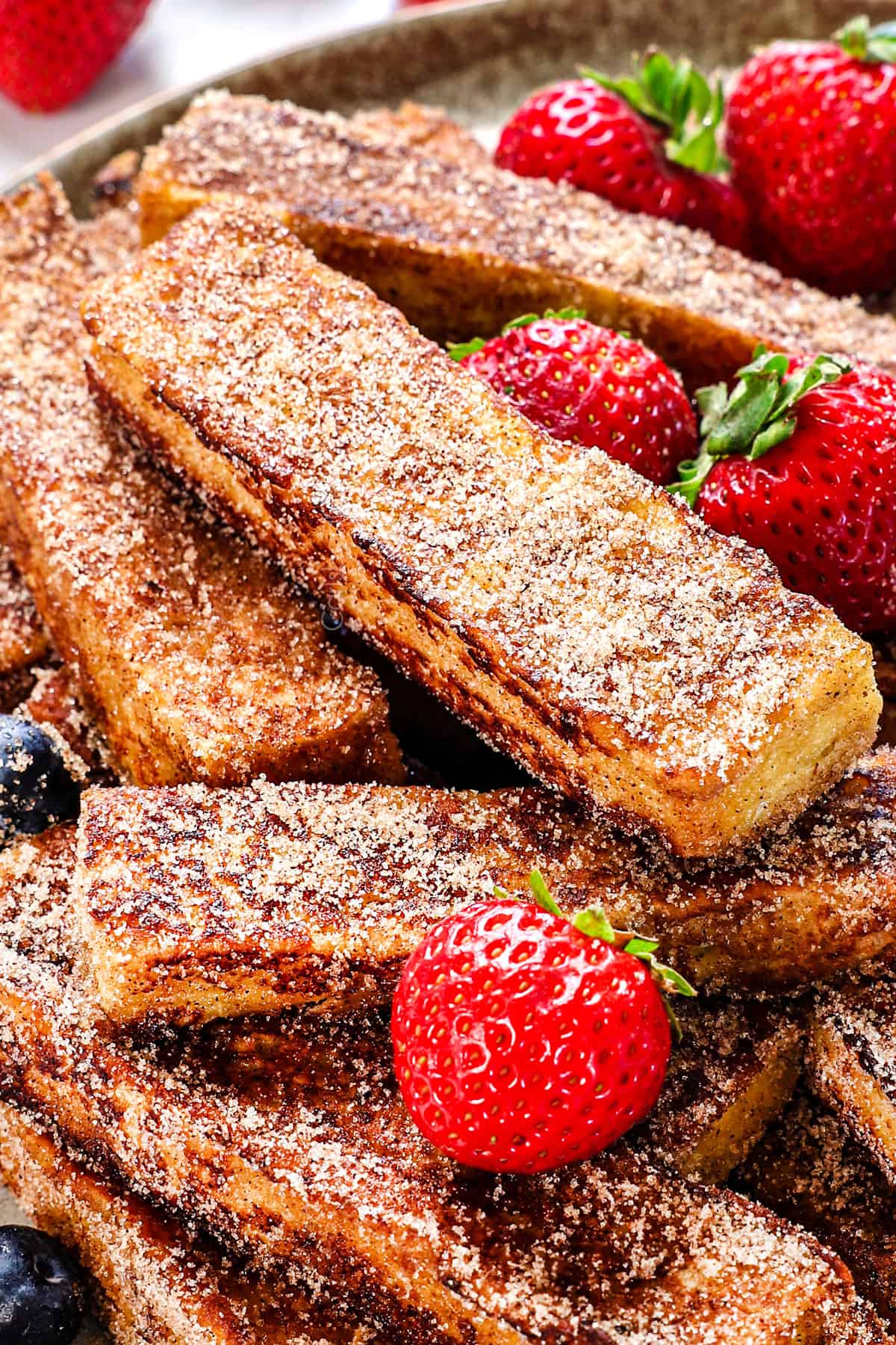 up close of French Toast sticks dusted in cinnamon and sugar