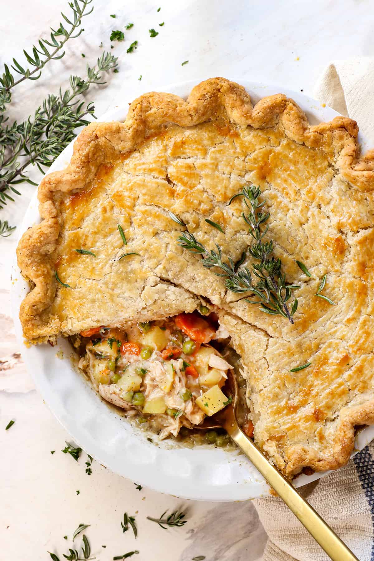 showing how to make chicken pot pie by baking until the crust is golden