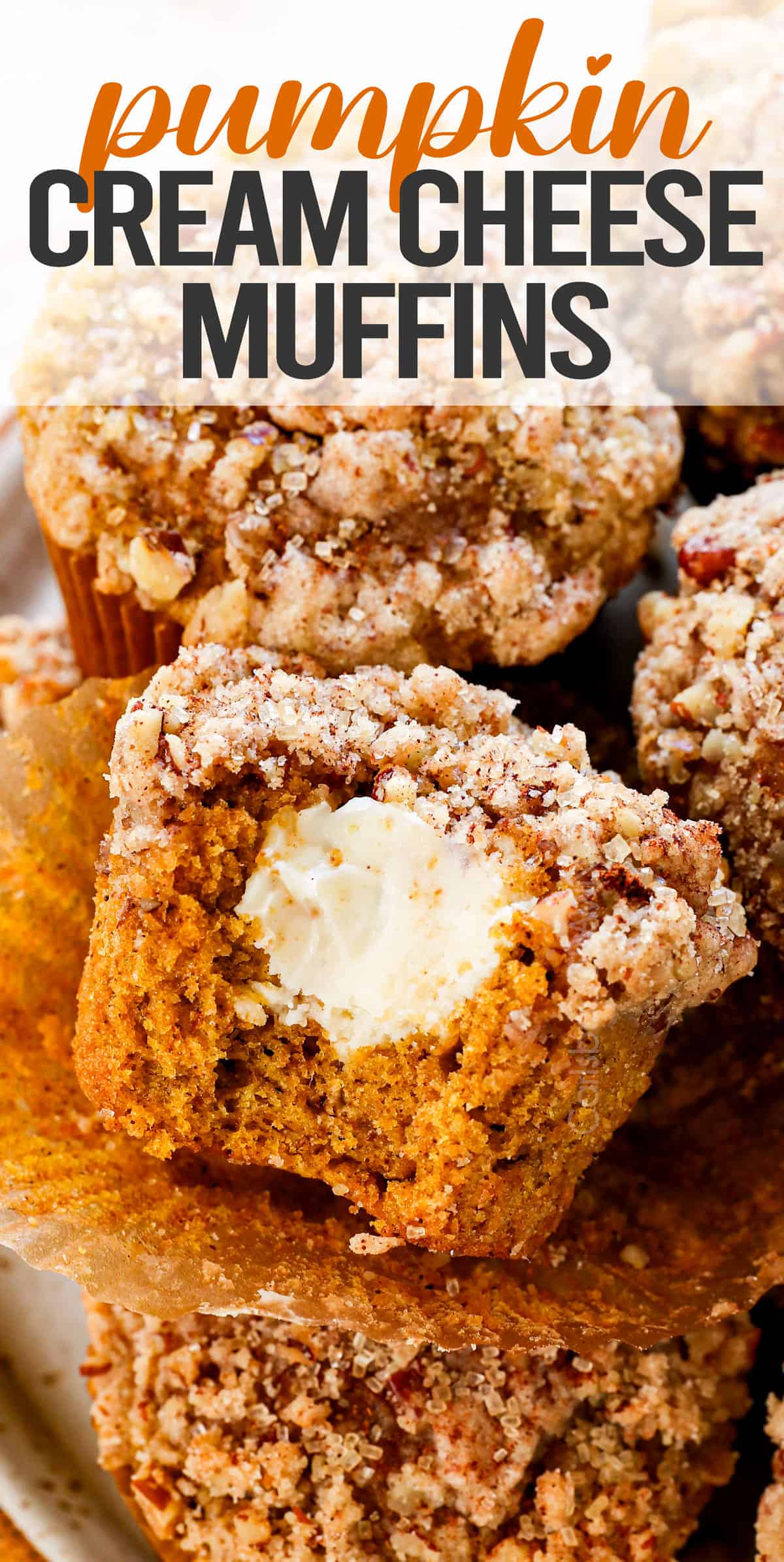 pumpkin cheesecake muffins with streusel topping on a plate