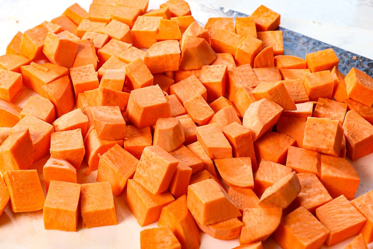 how to roast sweet potatoes by cutting the potatoes into 1/2-inch cubes