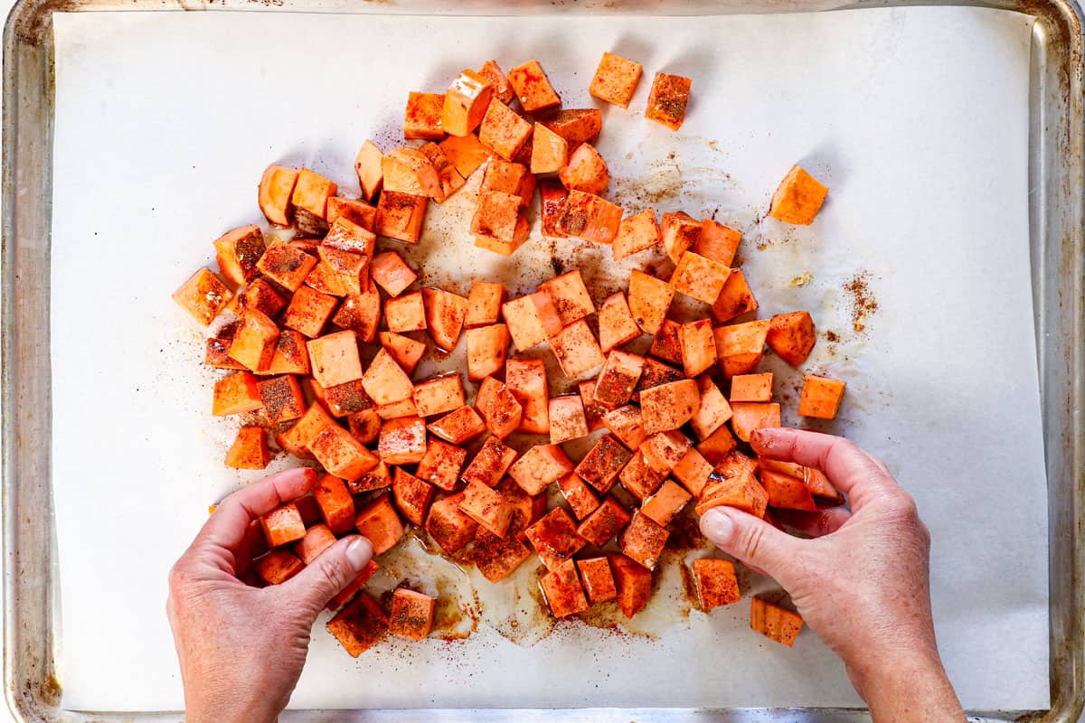 how to roast sweet potatoes by tossing the potatoes in olive oil and spices 