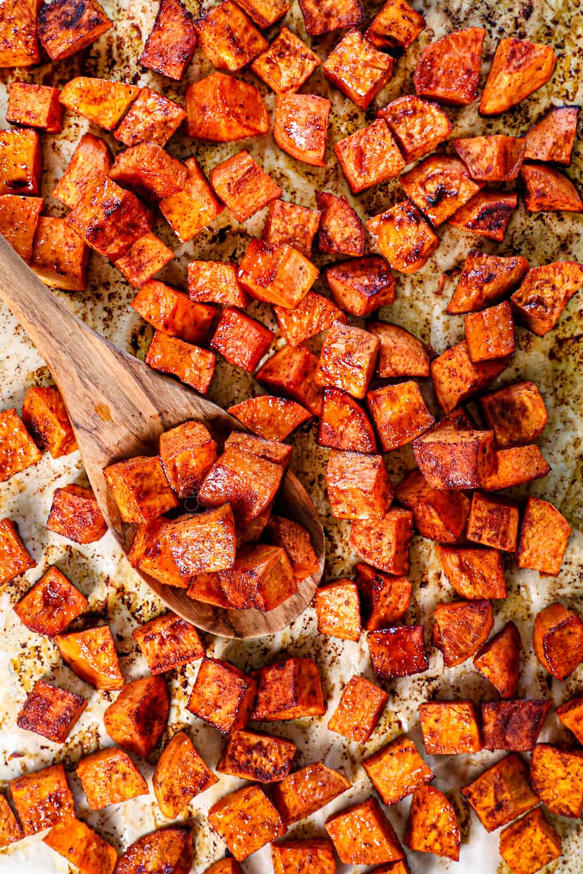 how to roast sweet potatoes by roasting until tender on the inside and crispy on the edges