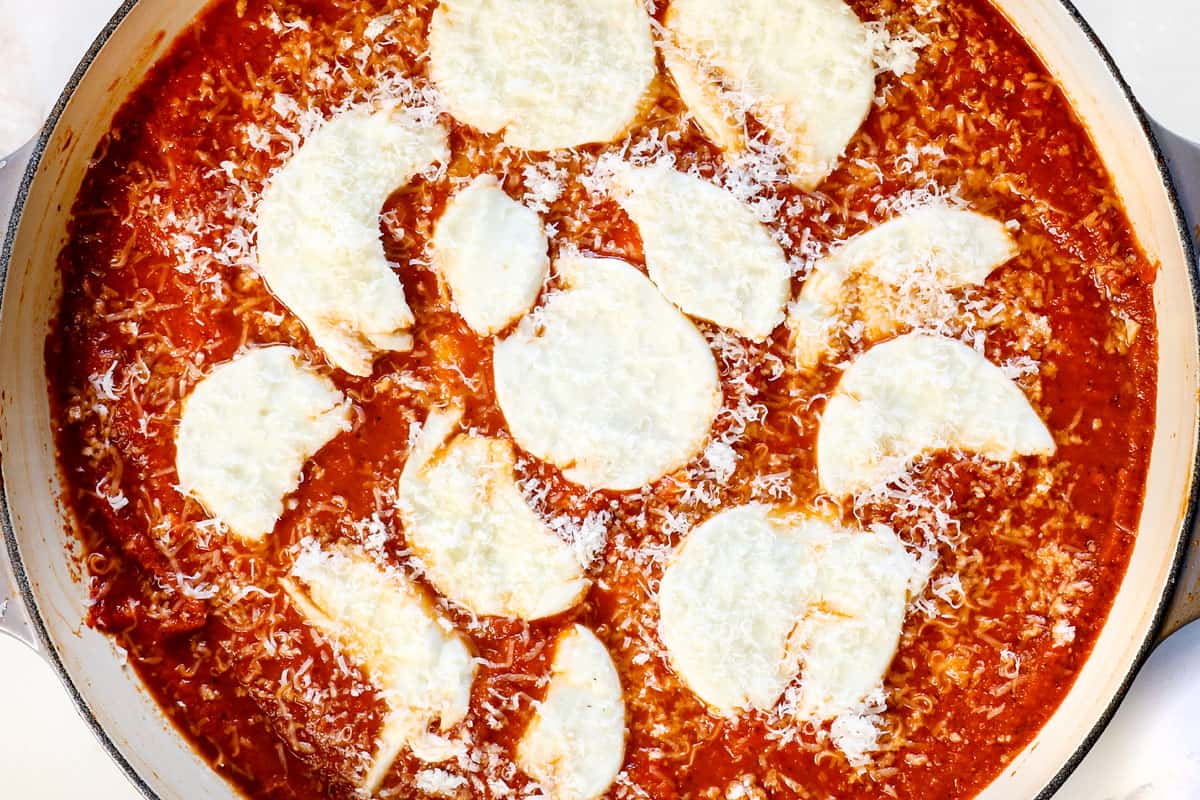 showing how to make gnocchi alla sorrentina by layering the top of the dish with fresh mozzarella 