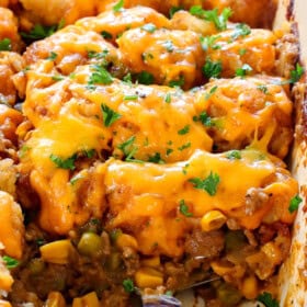 up close of cheesy tater tot casserole showing how cheesy it is