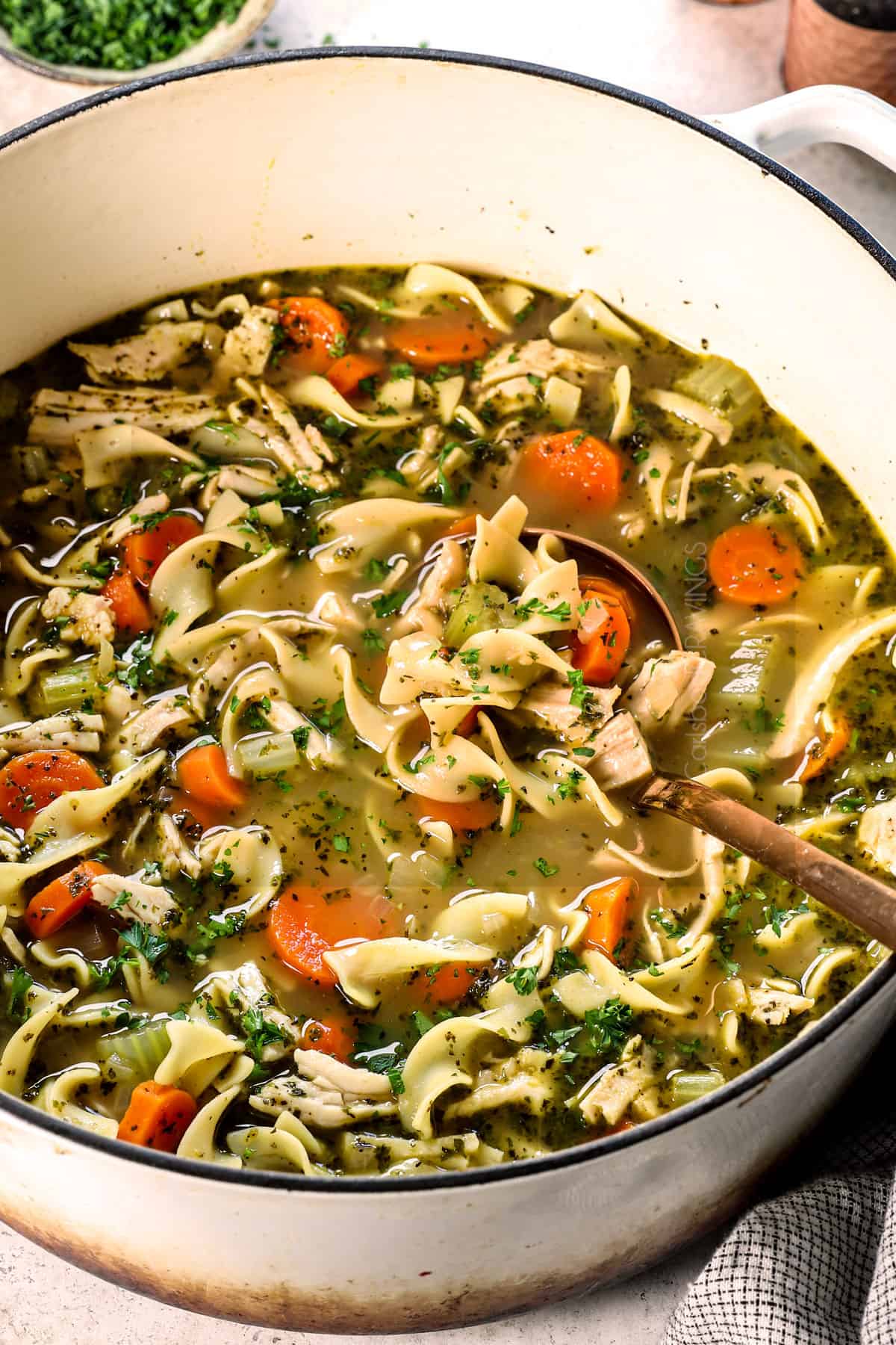 showing how to make turkey soup by adding additional broth