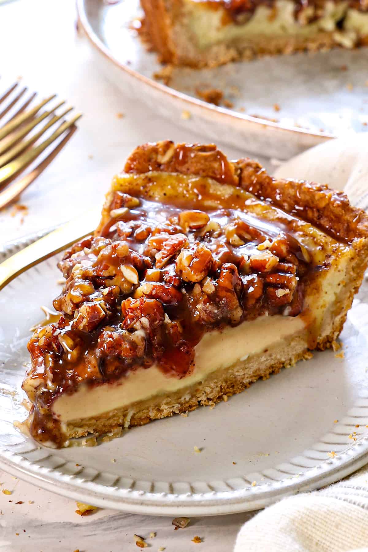 a slice of old fashioned custard pie made with eggs, sugar, vanilla, nutmeg, milk and cream on a plate