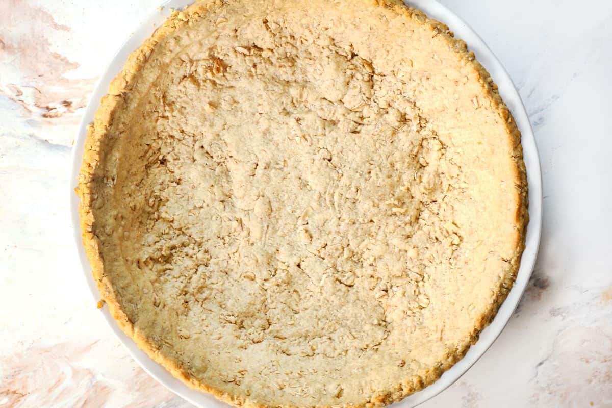 showing how to make custard pie by blind-baking the crust until golden