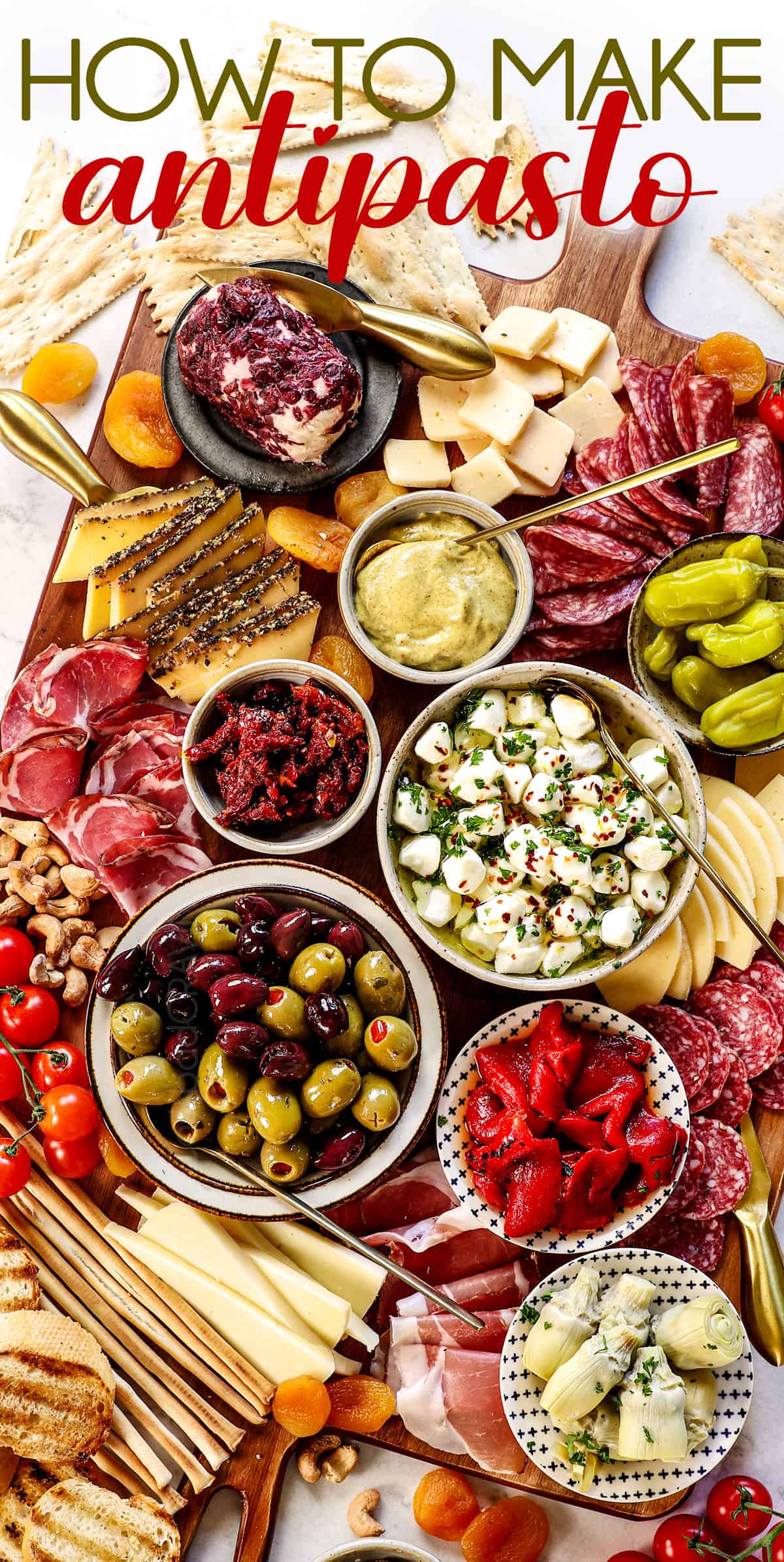 top view of antipasto platter showing cured meats, cheeses, pickled vegetables