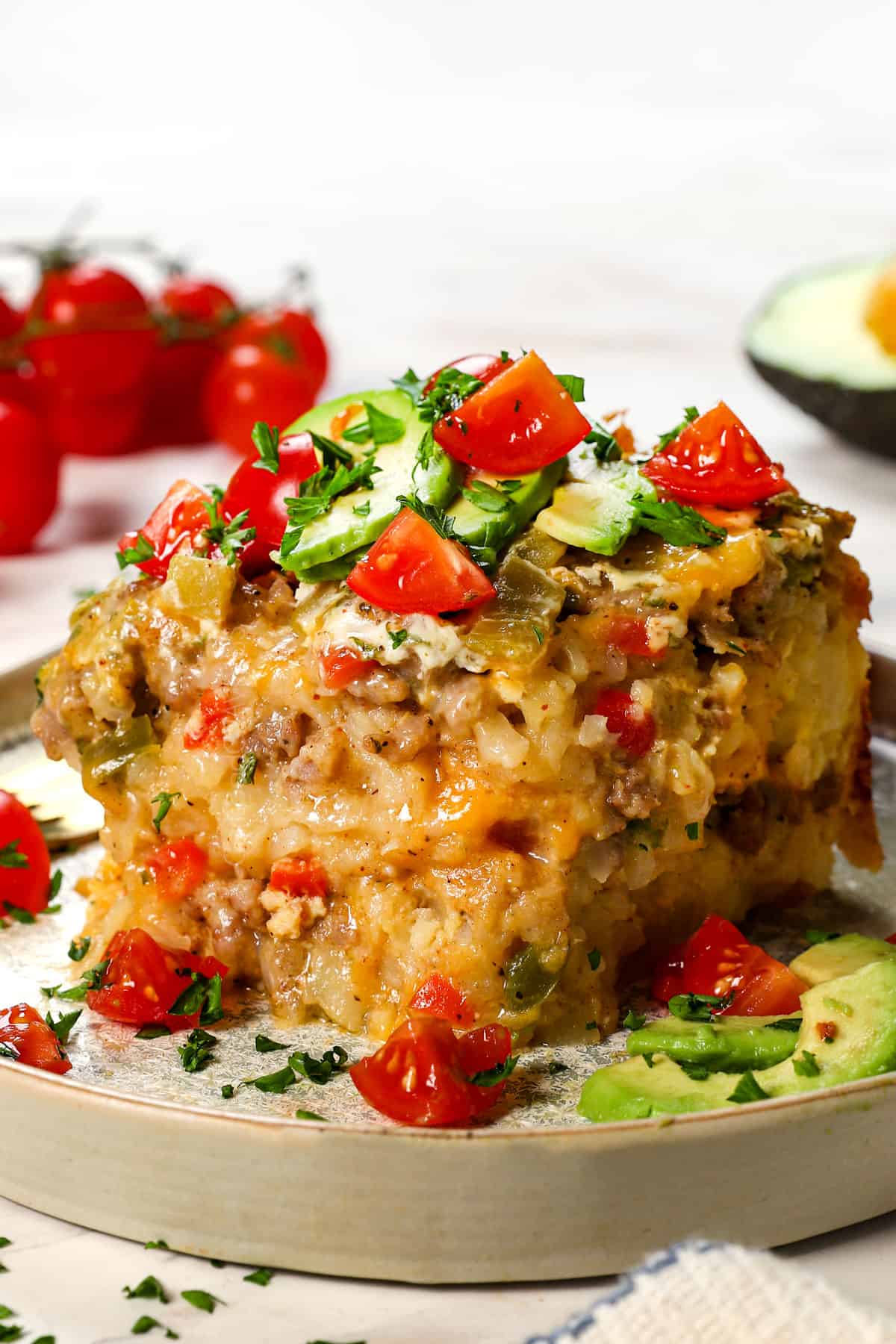 up close of a slice of slow cooker breakfast casserole showing the layers