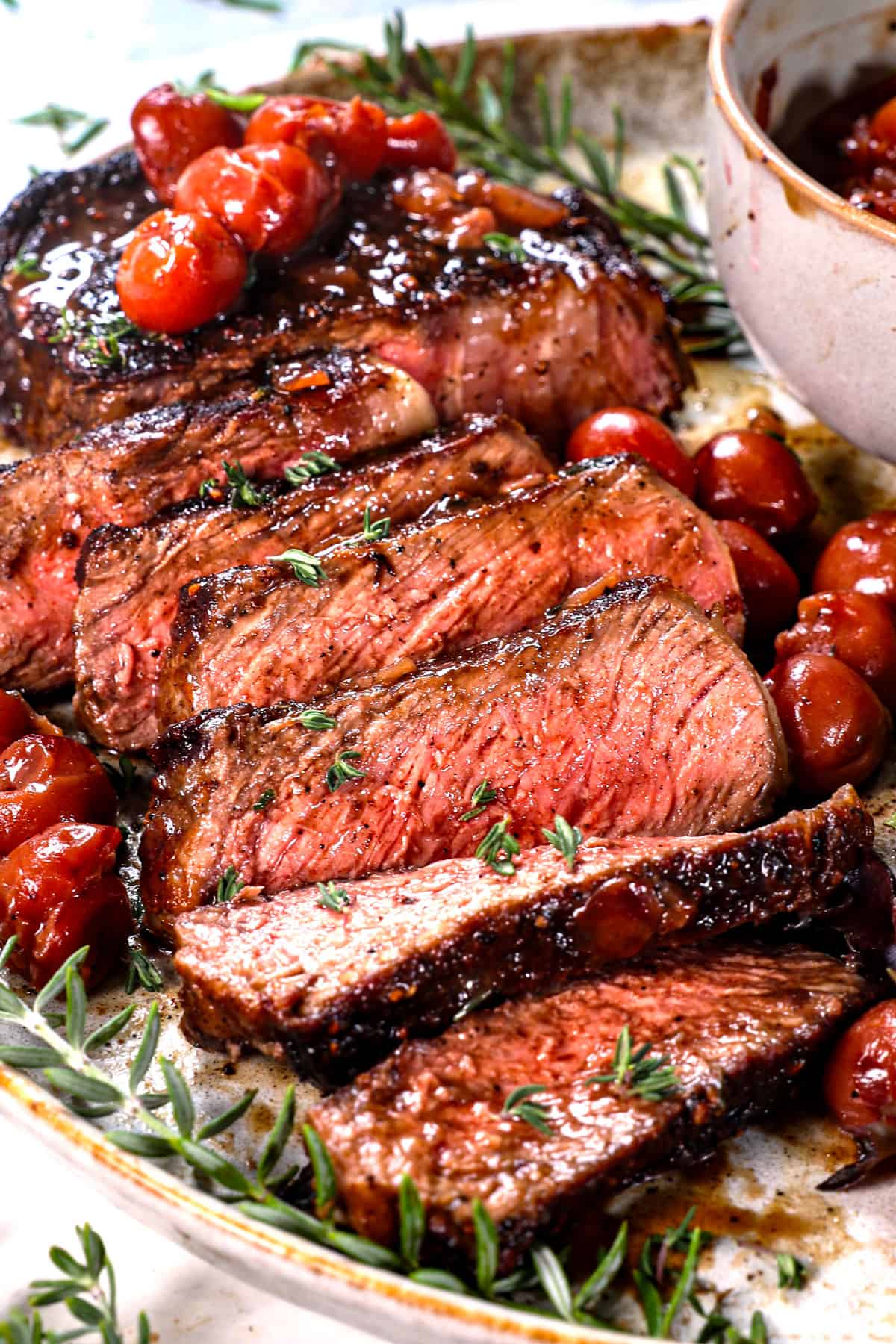 up close of sliced ribeye recipe showing the color of medium rare