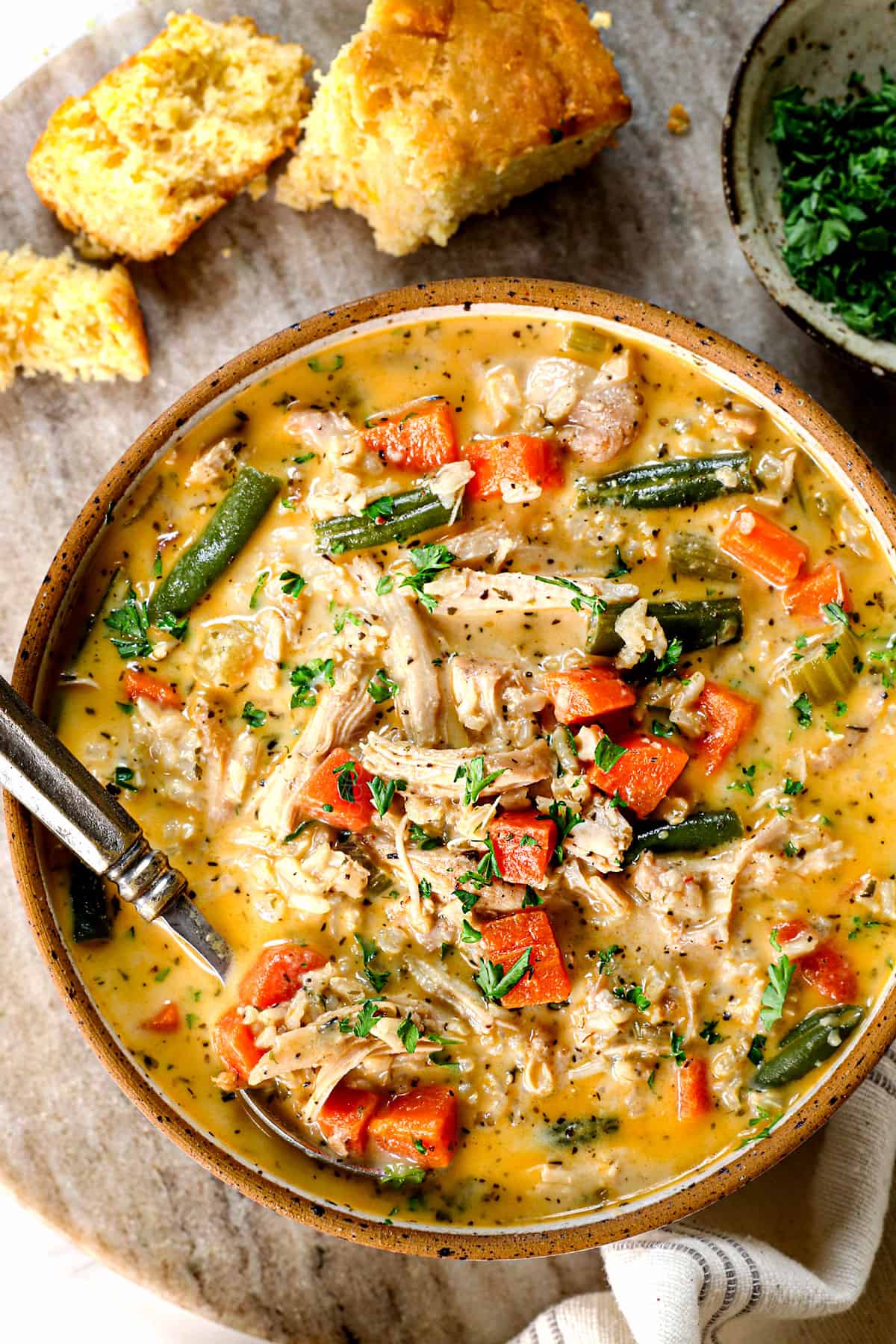 top view of a bowl of chicken rice soup recipe showing the ingredients