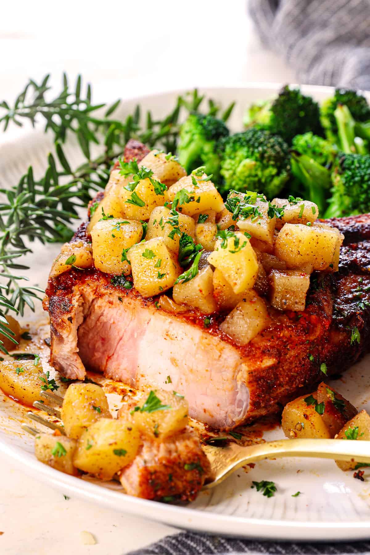 air fryer pork chop sliced showing the juicy slightly pink interior 