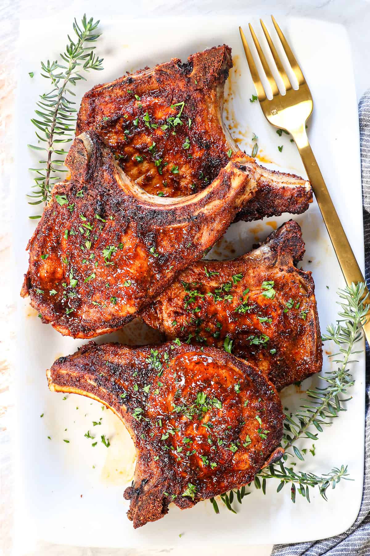 top view of air fry pork chops showing their beautiful sear and crispy exterior