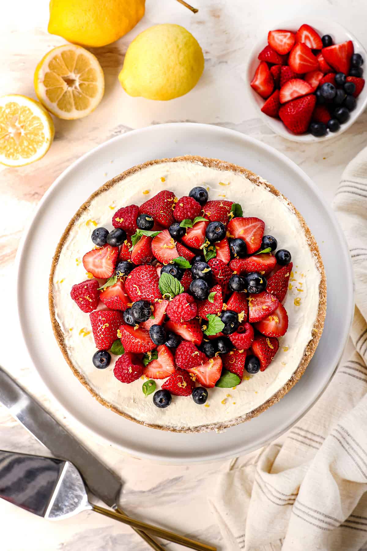 top view of no bake cheesecake recipe showing how to decorate it with berries