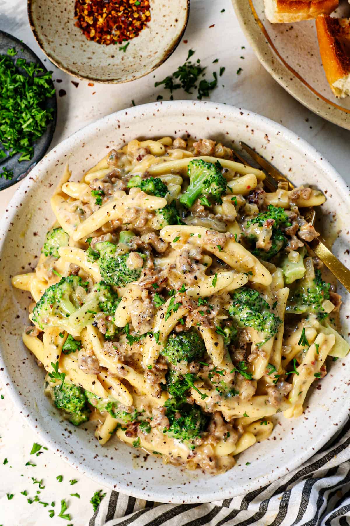 top view of cavatelli noodles with broccoli and sausage