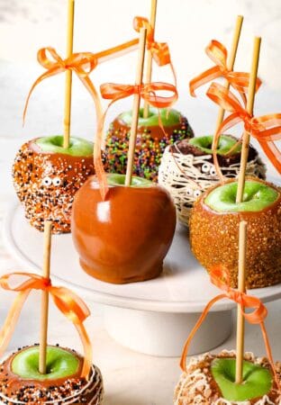 Caramel Apples on a display stand showing the variety of ways to decorate with toppings
