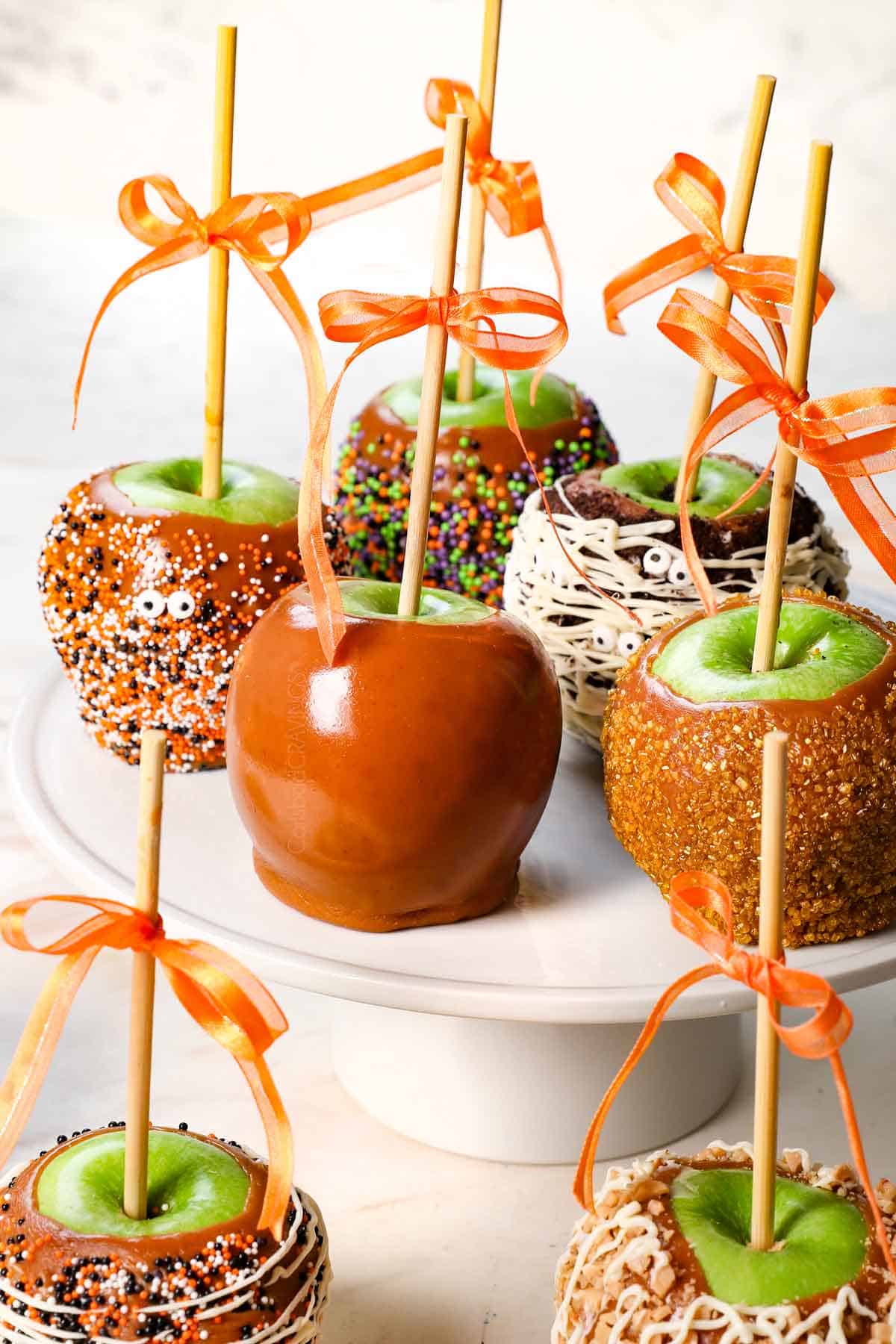 Caramel Apples on a display stand showing the variety of ways to decorate with toppings
