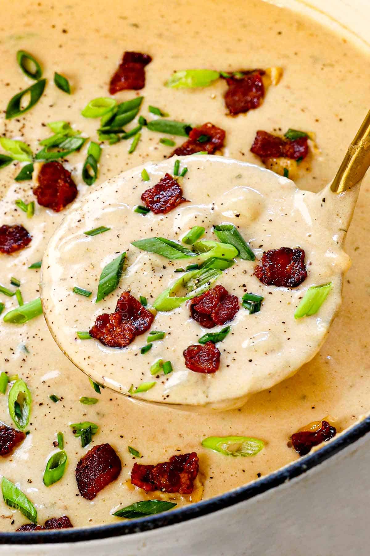 a ladle of baked potato soup recipe showing how creamy it is