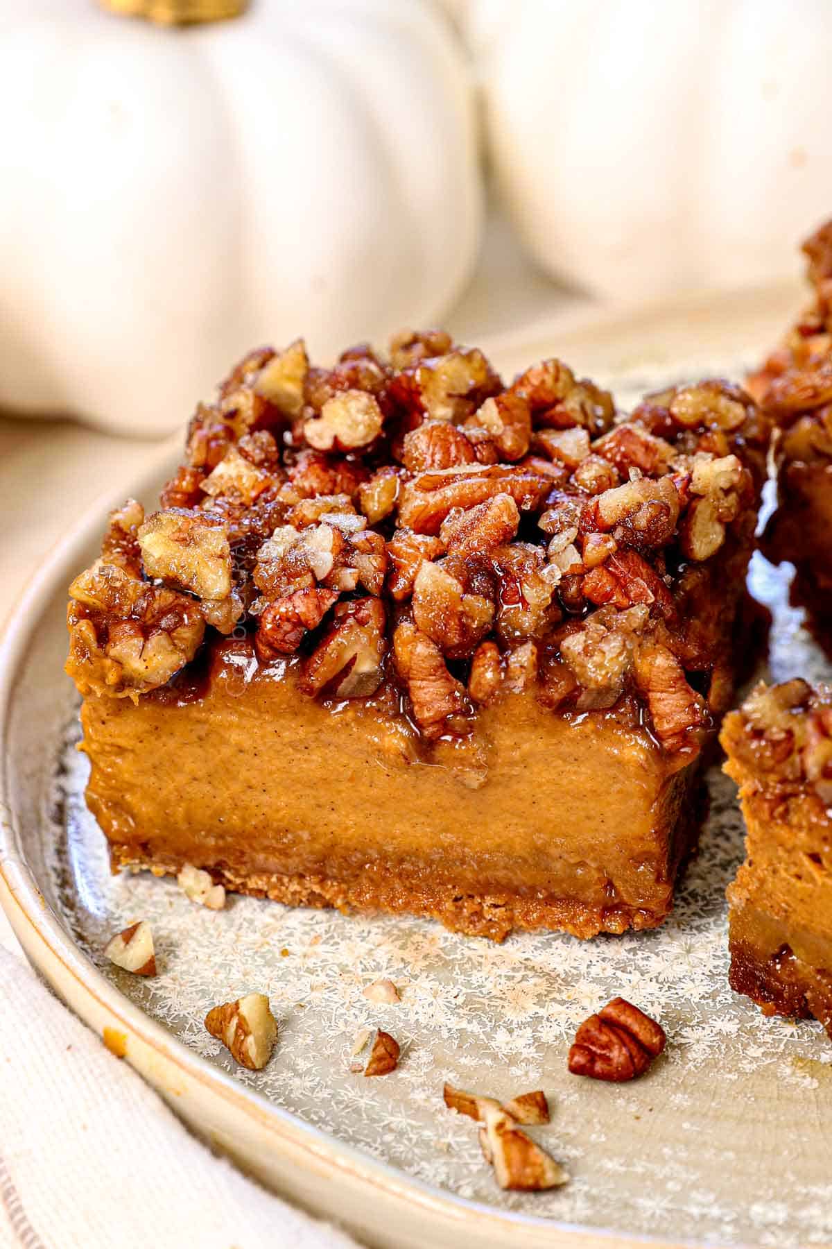up close of pumpkin bar on a plate showing how creamy it is