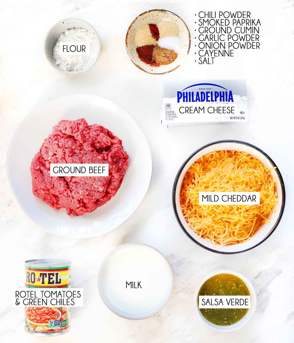 Top view of Rotel Dip Ingredients: Rotel Tomatoes and Green Chiles. Ground beef, cheddar cheese, cream cheese, spices, milk, and salsa verde