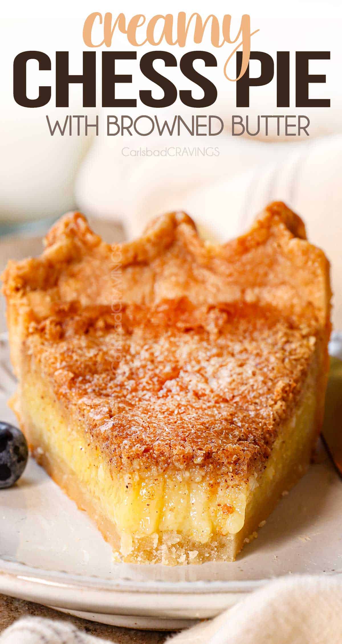 a slice of chess pie with a bite out of it showing how creamy it is