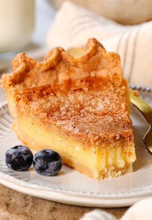 up close of chess pie recipe with a bite taken out showing how creamy it is
