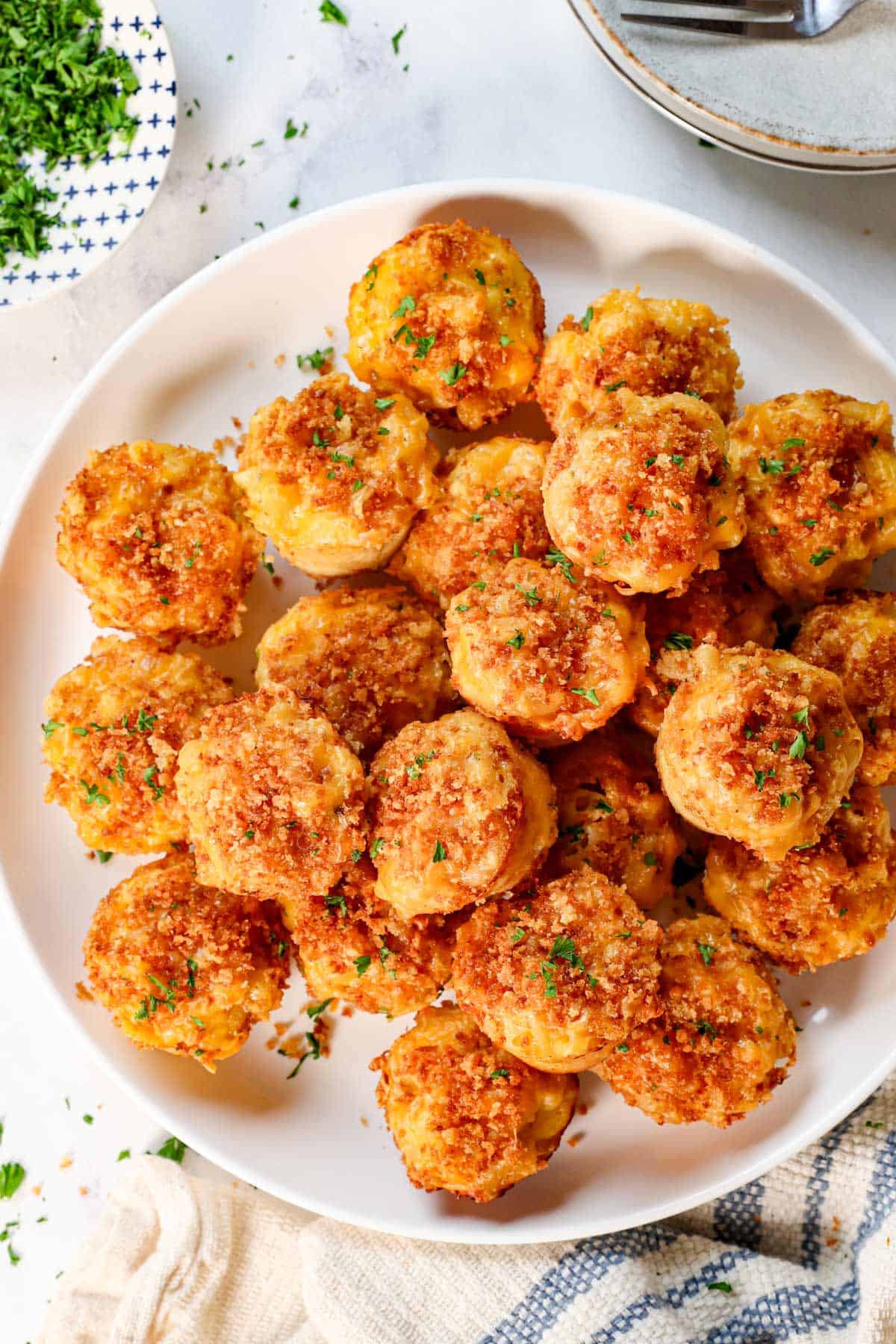 serving mac and cheese bites on a platter