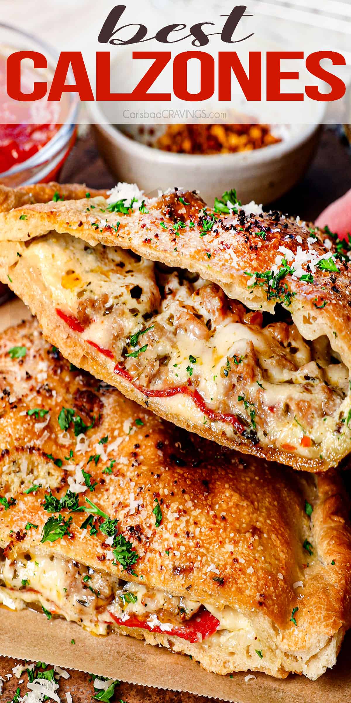 up close of holding up a bitten calzone to show the filling inside