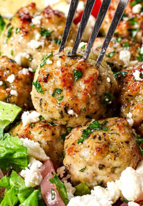 a fork piercing the best chicken meatballs to eat
