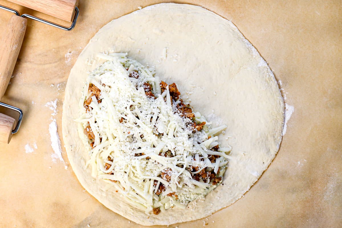 showing how to make calzone recipe by adding ricotta white sauce and toppings