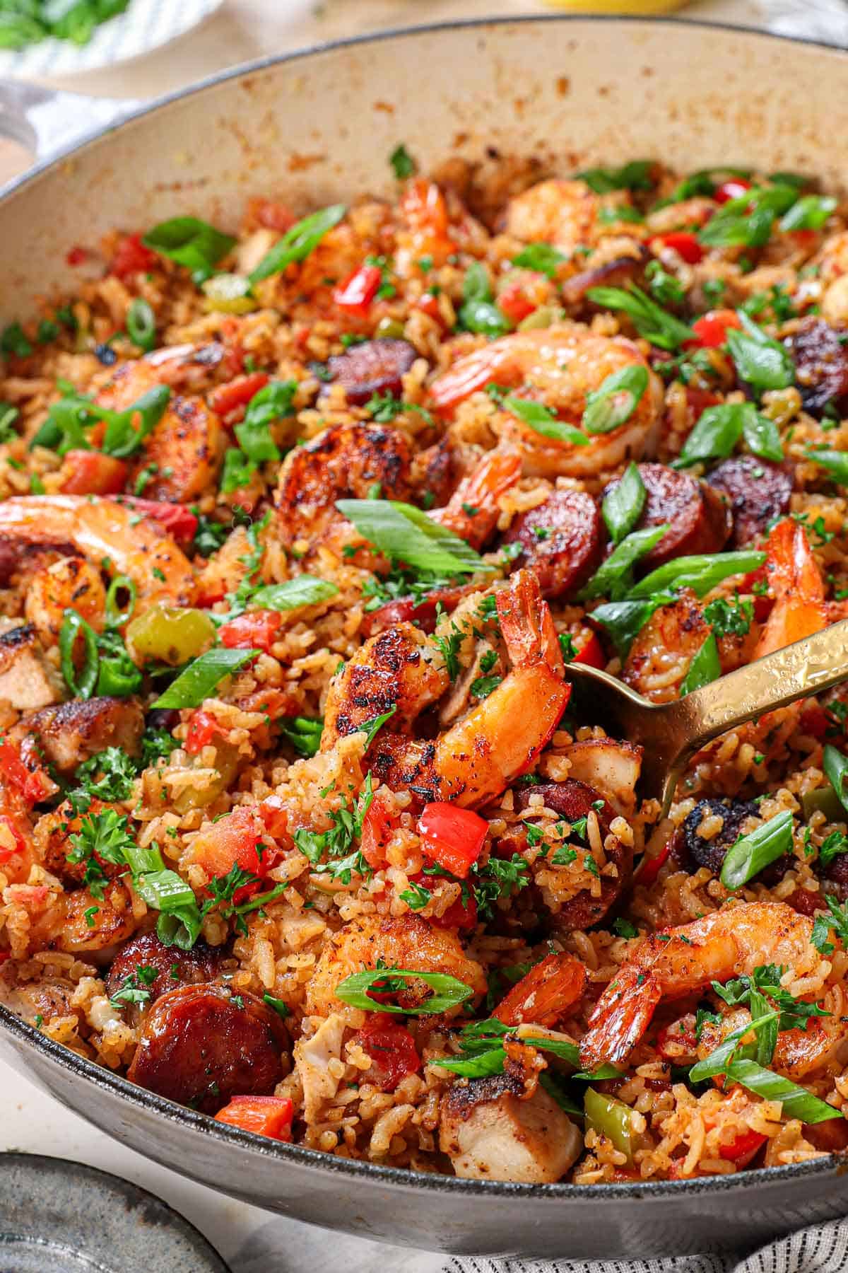 Cajun jambalaya in a pan showing the texture of the fluffy, perfectly cooked rice