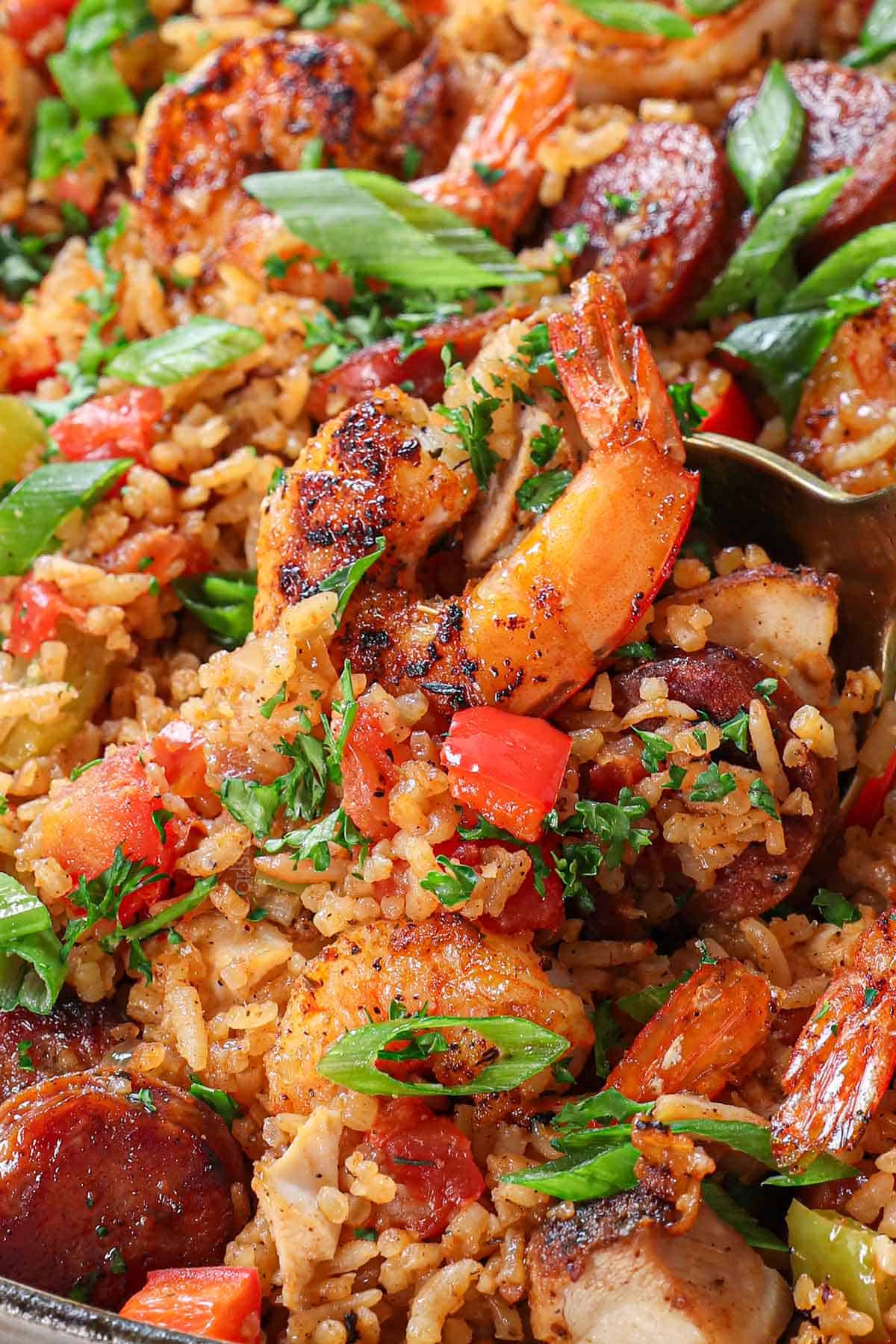 Cajun jambalaya in a pan showing the texture of the fluffy, perfectly cooked rice