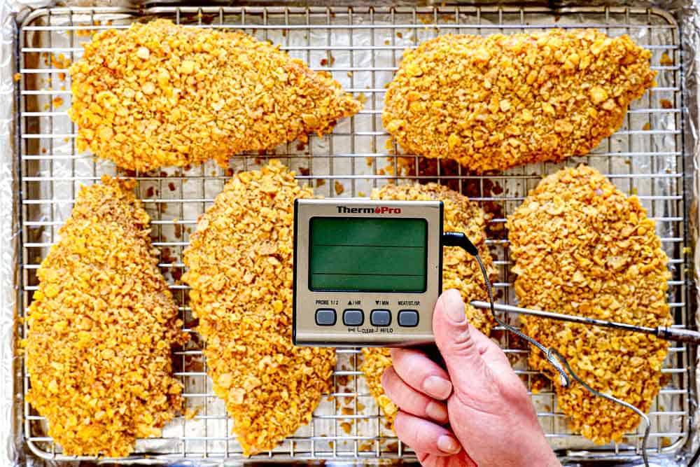 showing how to make hot honey chicken by inserting a digital probe thermometer, then baking until cooked through