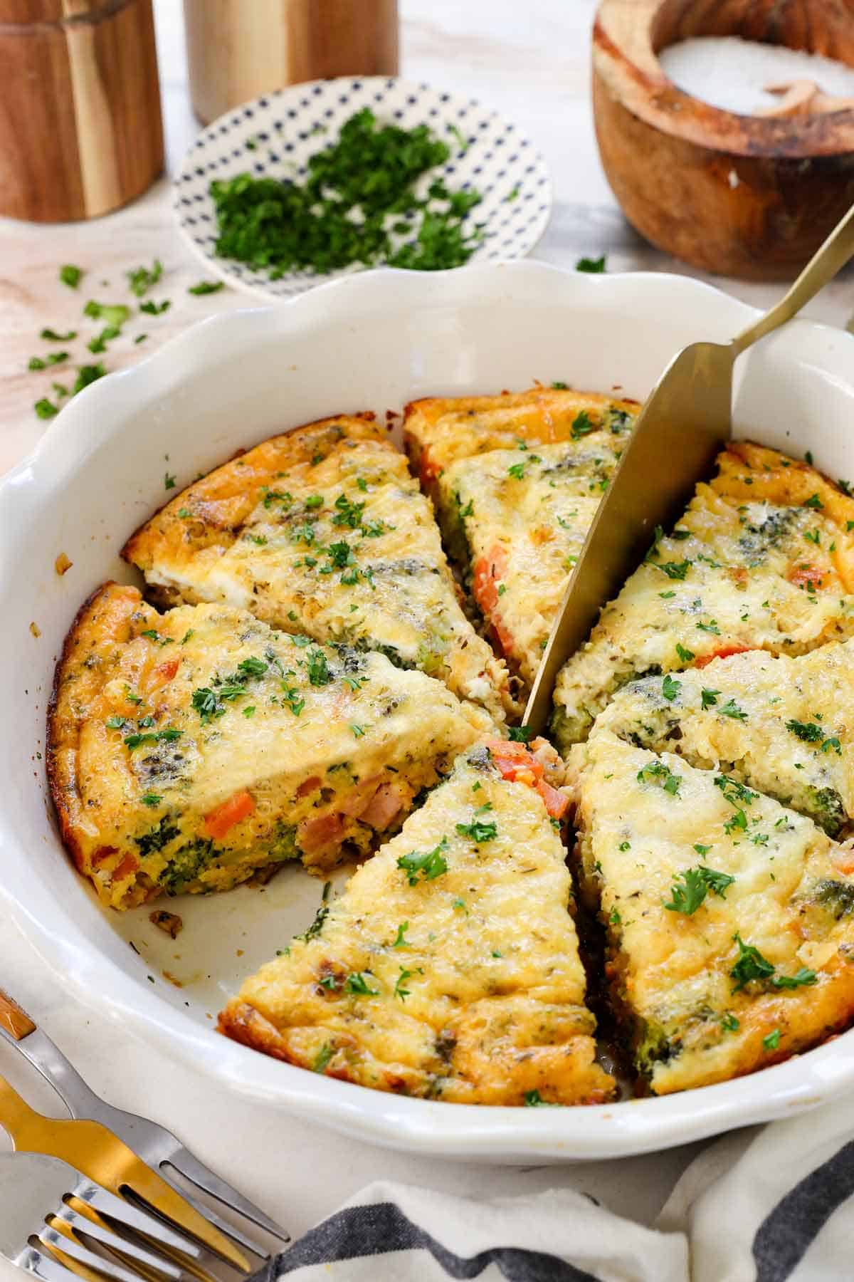 showing how to make crustless quiche by baking until cooked through