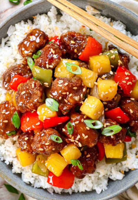 Top view of sweet and sour pork being served with rice