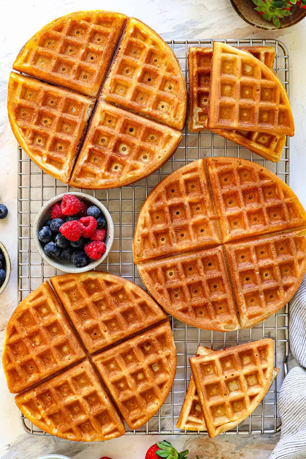 showing how to make Belgian waffle recipe by cooking until golden and crisp on the outside