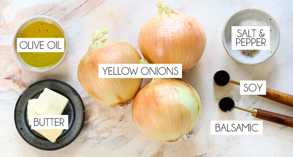 top view of caramelized onions recipe ingredients: yellow onions, olive oil, butter, balsamic, soy sauce, salt, pepper